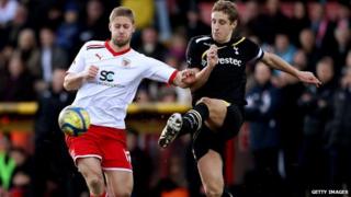 Dawson of Spurs and May of Stevenage in tackle
