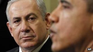 Barack Obama speaks and Benjamin Netanyahu listens on