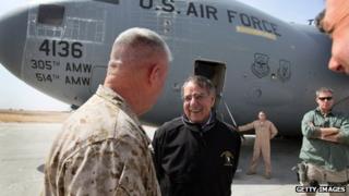 Leon Panetta (centre) after arriving at Camp Bastion (14 March 2012)