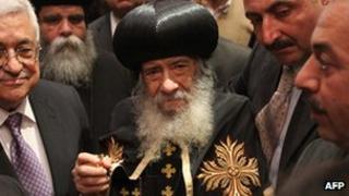 Pope of the Coptic Orthodox Church of Alexandria Shenouda III (C) meets with Palestinian president Mahmoud Abbas (L) at the Abassiya headquarters in Cairo, Egypt - 7 April 2011