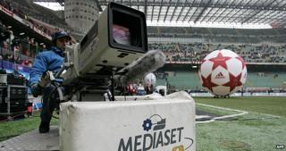 Cameraman at a sports event