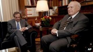 Greek President Karolos Papoulias, right, with Antonis Samaras