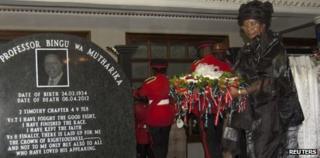 Malawi's President Joyce Banda lays a wreath during a funeral service for late president Bingu wa Mutharika