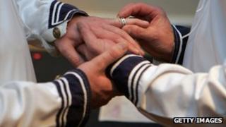 Two men tie the knot