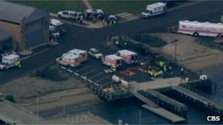 Aerial shot of ambulances waiting in Sandy Hook, NJ 11 June 2012