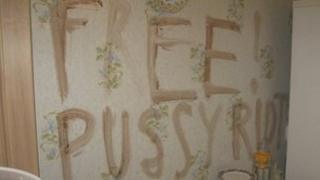The messaged daubed in blood on the wall of the victim's apartment