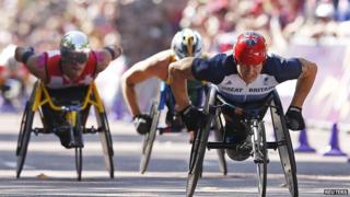 David Weir leading two other athletes