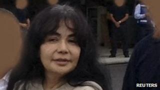 Sandra Avila is escorted to a plane for extradition to the US on 9 August 2012