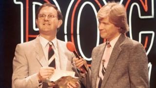 Michael Hurll (left) on the set of The British Rock and Pop Awards with David Jensen in 1984