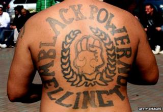 Man with tattooed back