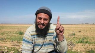 Abubakr Moussa smiling in field