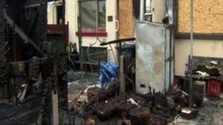 The scene at the rear of the house following an arson attack last week