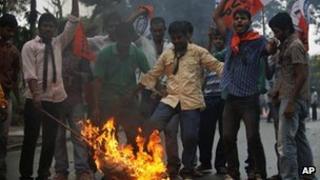 File photo: students demanding the creation of a new Telangana state burn an effigy during a protest in Andhra Pradesh on 1 November 2012