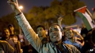 Egyptians chant slogans against latest Israel air strikes in Gaza during a protest in Cairo