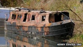 Burned out houseboat