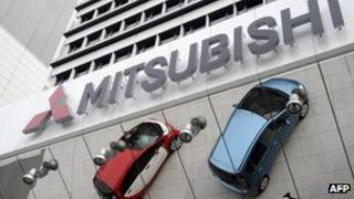 Cars outside a Mitsubishi showroom