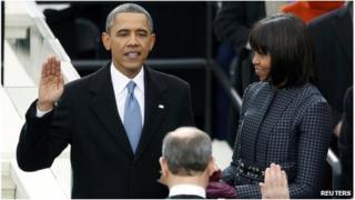 US President Barack Obama is sworn in by Supreme Court Justice John Roberts in Washington on 21 January 2013