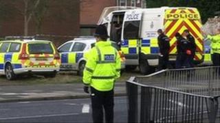 Police officers at the scene of the shooting