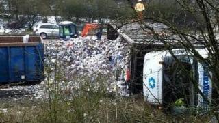 Overturned lorry on road