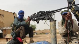 Islamist fighters man a position near Gao airport, file pic from August 2012