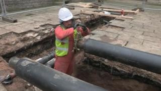 Heating pipes being laid