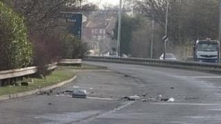 Debris on the road at the crash site