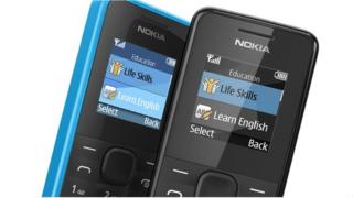 Nokia 105 mobile phone. It is a classic style mobile phone with a small screen and alphanumeric keypad. The housing is cyan blue.