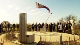 Enthusiasts, reenactors and local officials attended the ceremony
