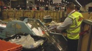 A Royal Mail worker at Gloucester mail centre