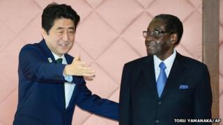 Robert Mugabe and Japanese PM Shinzo Abe (left) prior to talks in Yokohama, Japan (1 June 2013)
