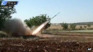 A rocket fired by Syrian rebels in Qusair, Syria, according to citizen journalists (May 28, 2013)
