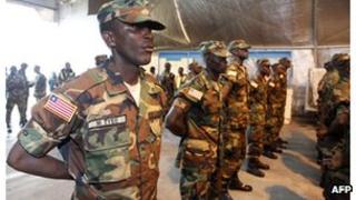 Liberian troops stand in rows before joining the current African-led International Support Mission to Mali, 20 June.