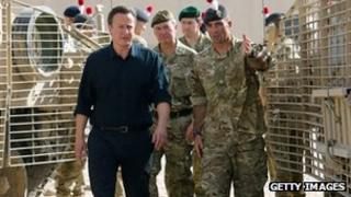 David Cameron meets British troops on his recent visit to Afghanistan