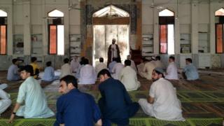 Nervous worshippers at mosque in Peshawar