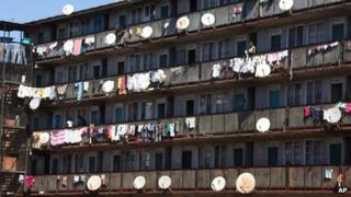 An apartment block with satellite dishes in Harare, Zimbabwe