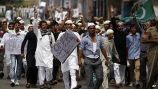 Muslims protest against the fatal shootings of four villagers by government troops on Thursday, in Jammu, India, Friday, July 19, 2013