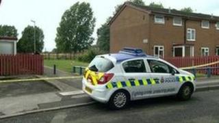 Police car at the scene of the stabbing
