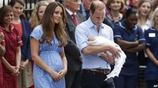 The Duke and Duchess of Cambridge with their son