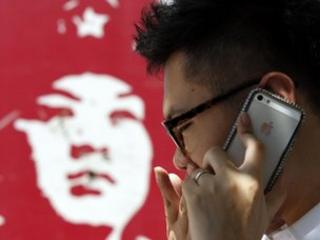Chinese man using iPhone