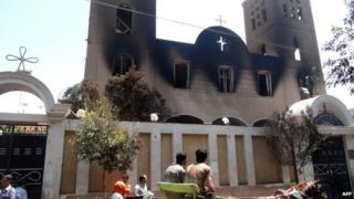 A picture taken on 14 August 2013, showing the facade of the Prince Tadros Coptic church after being torched by unknown assailants in the central Egyptian city of Minya