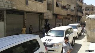 UN vehicles in the Damascus suburb of Mouadamiya