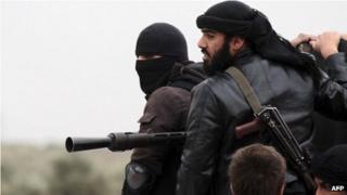 Members of the jihadist group, al-Nusra Front, in Aziza, Syria (4 April 2013)