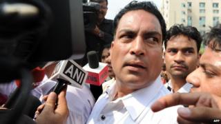 Indian Defence lawyer AP Singh addresses the media outside the Saket Court complex in New Delhi on September 11, 2013