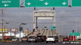 Cars pass over the Danziger Bridge July 14, 2010 in New Orleans, Louisiana.