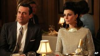 Jon Hamm as Don Draper, left, and Jessica Pare as Megan Draper