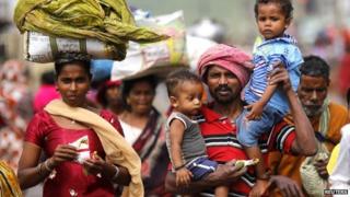 Some families have started returning to their cyclone-hit homes in Orissa