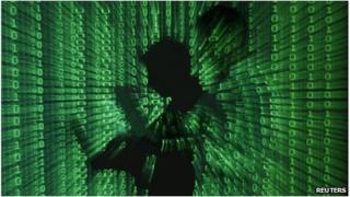 Digital image of man holding laptop