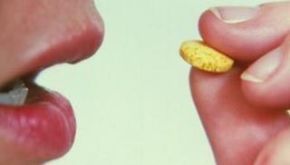 child takes pill