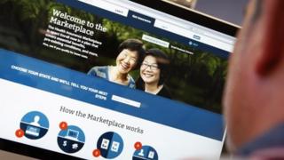 A man looks at the Affordable Care Act sign-up page on the official website.