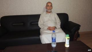 A picture distributed by the Egyptian interior ministry shows Mohammed Badie following his arrest in the early hours of August 20, 2013 in Cairo